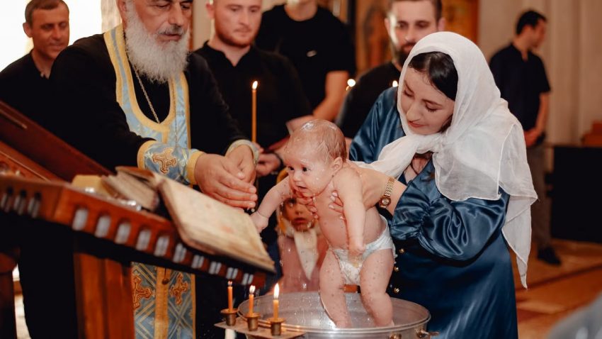 A serene moment depicting a traditional Christian baby baptism ceremony in a church.